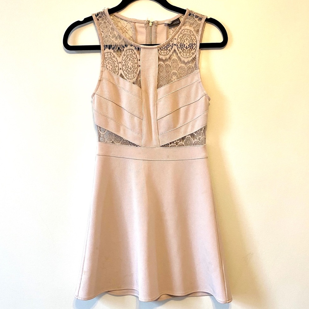 Fit and flare dress with lace cutouts